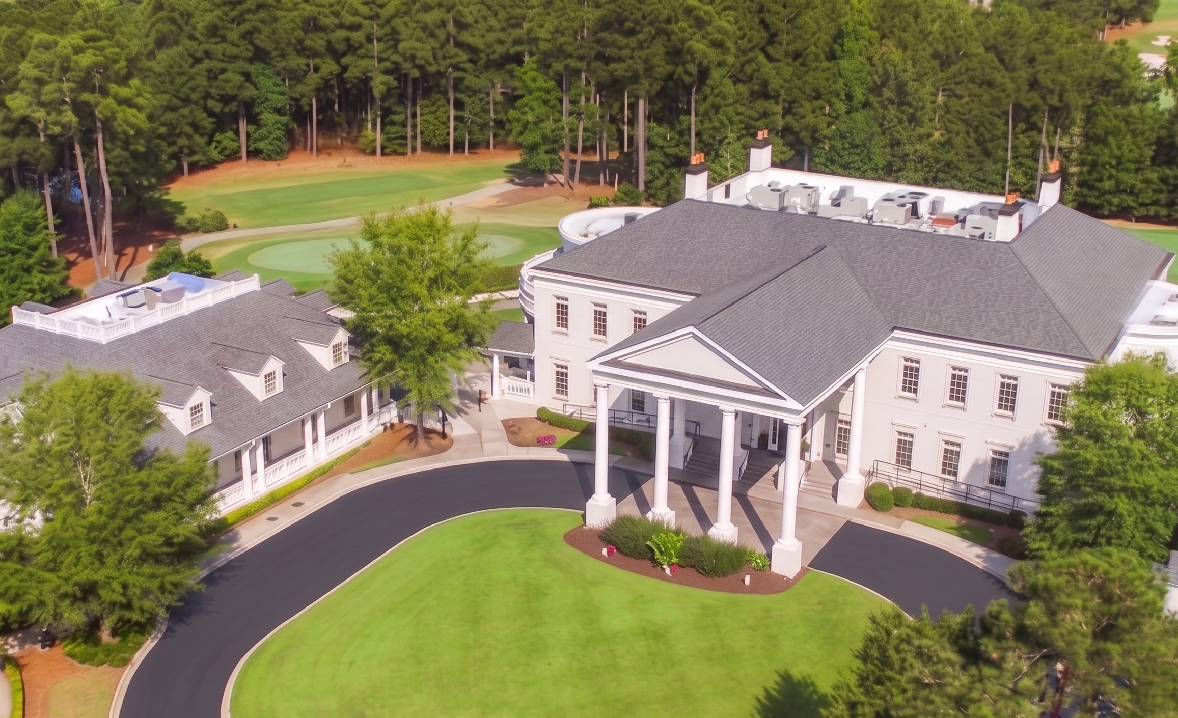 Aerial view of the Governors Towne Club main clubhouse with golf course in Acworth GA
